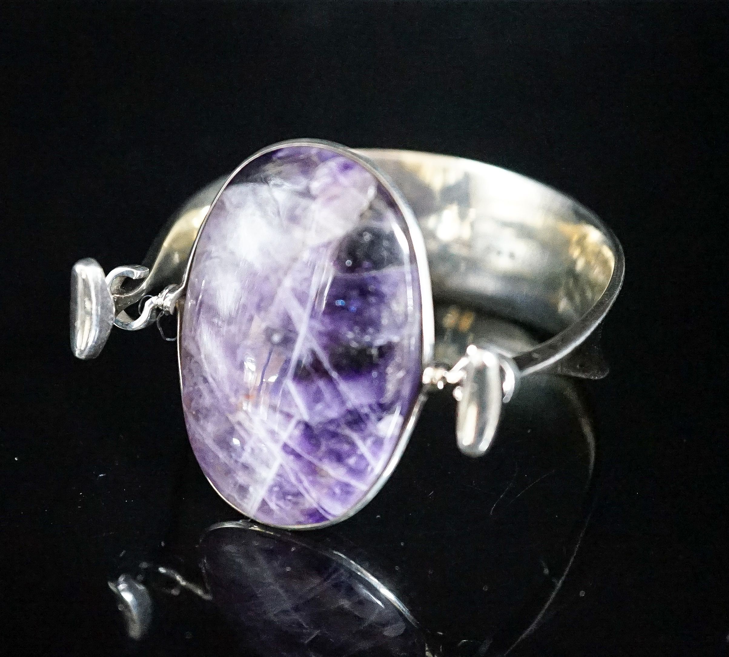 A Vivianna Torun for Georg Jensen sterling and amethyst quartz set openwork bangle, no 203, stone length approx. 43mm.